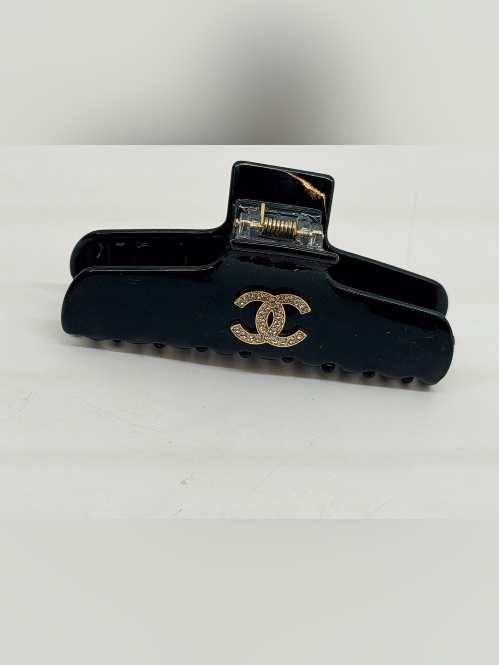 Black Rhinestone Logo Hair Clip